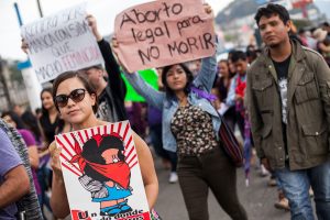 Women and men carrying banners with slogans during the march on April 24 in San Cristobal de Las Casas, Chiapas © Aarón Cadena Ovalle