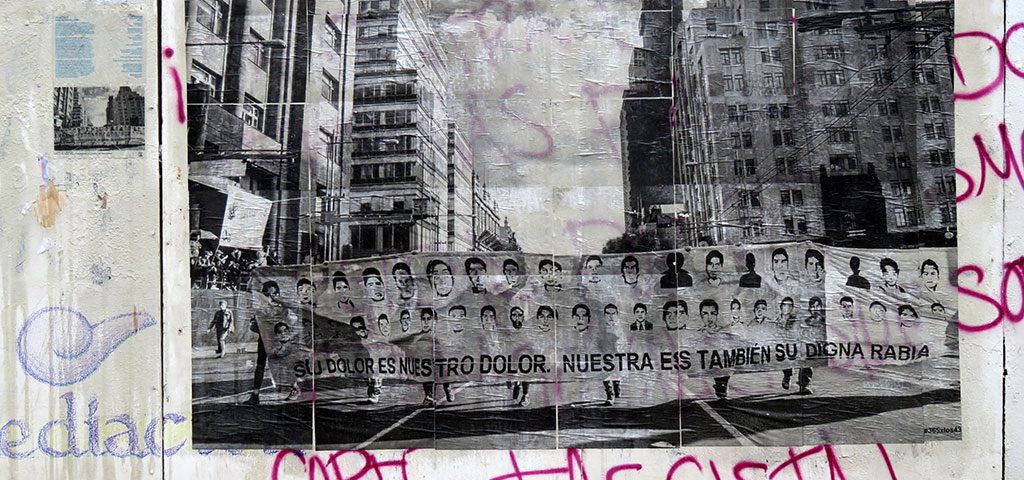 Mural en el evento cultural que se llevó a cabo el 26 de junio en San Cristóbal de las Casas a 21 meses de la desaparición de los 43 estudiantes de Ayotzinapa © SIPAZ